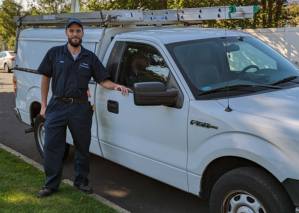 Brennan Termite and Pest Control technician performing termite extermination on Long Island